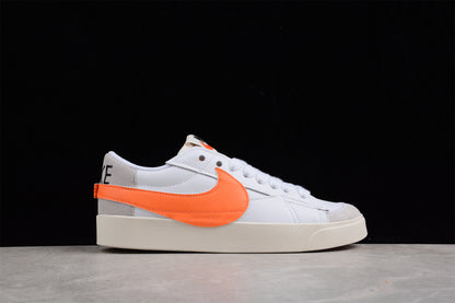 Blazer Low '77 blanco y naranja