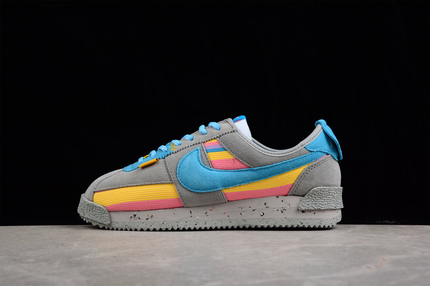 Cortez x Union LA gris, azul, amarillo y rosa