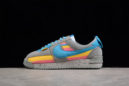 Cortez x Union LA gris, azul, amarillo y rosa