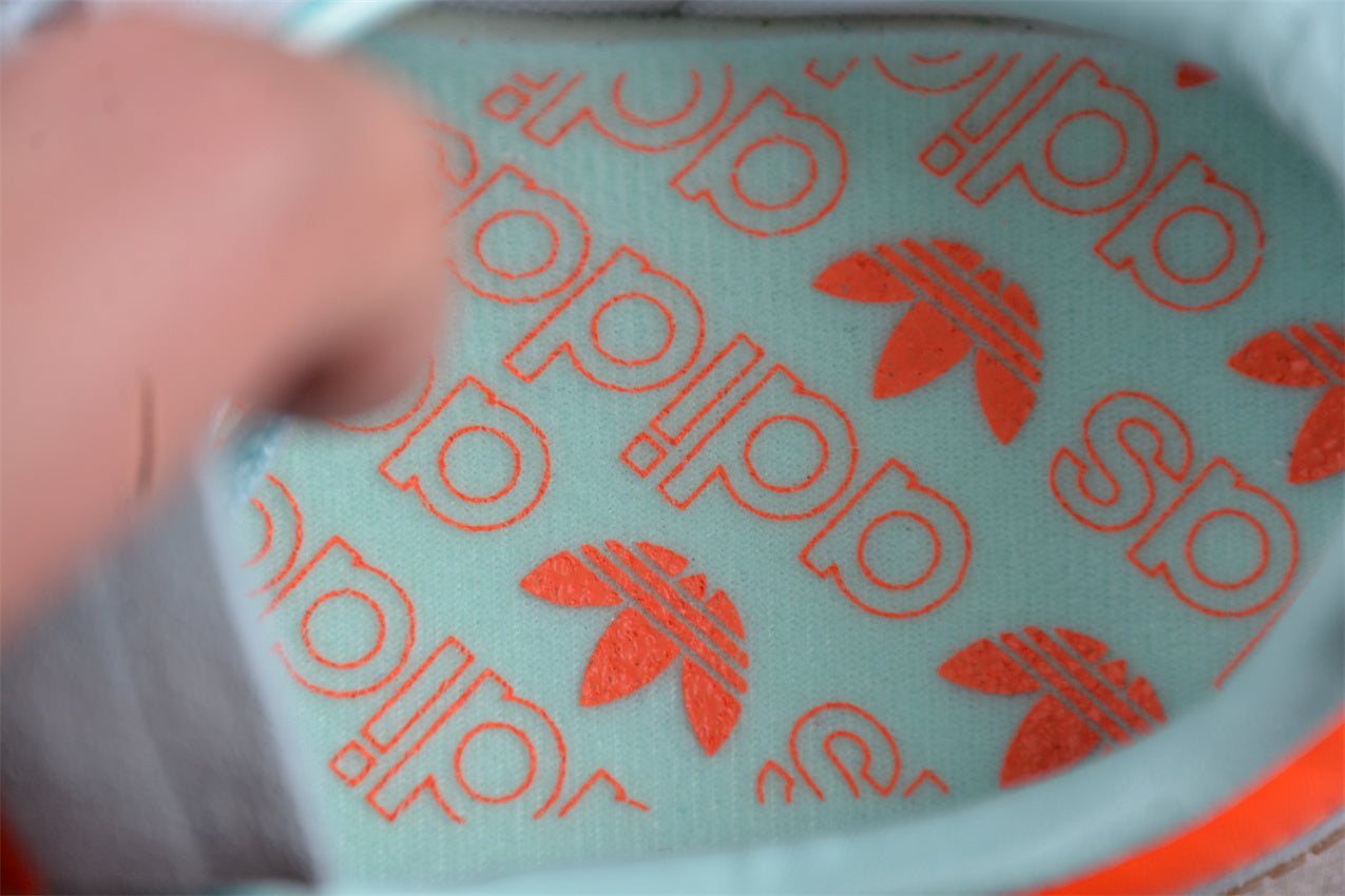 Handball Spezial azul cielo y naranja